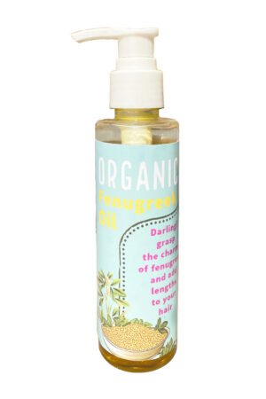 Herbal fenugreek hair oil in clear bottle with white pump cap