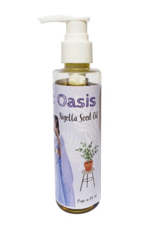 Herbal nigella seed hair oil in clear bottle with white pump cap